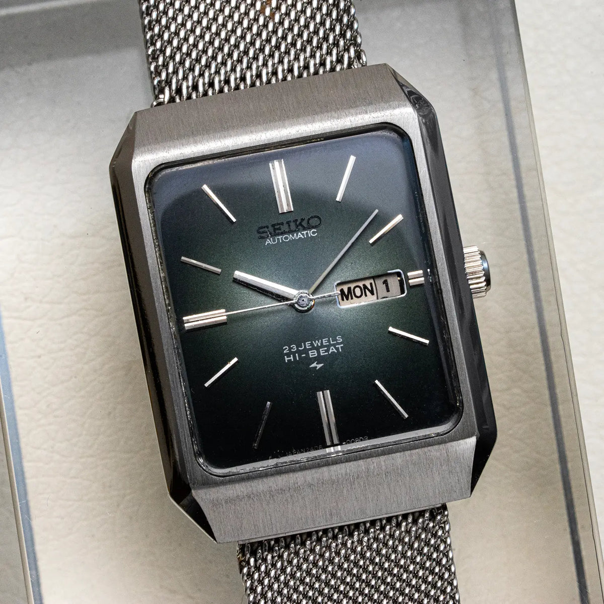Seiko Hi-Beat 2406-3020 from 1973 with green fumé rectangular dial, stainless steel case and day-date