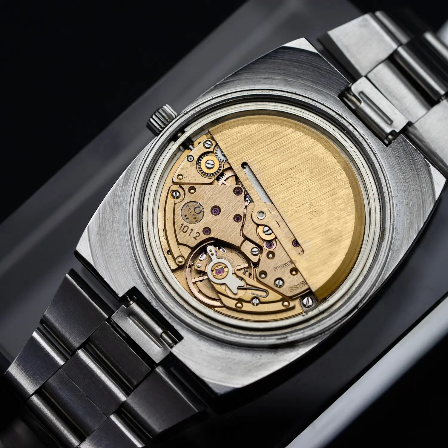 Automatic vintage watch movement on black background