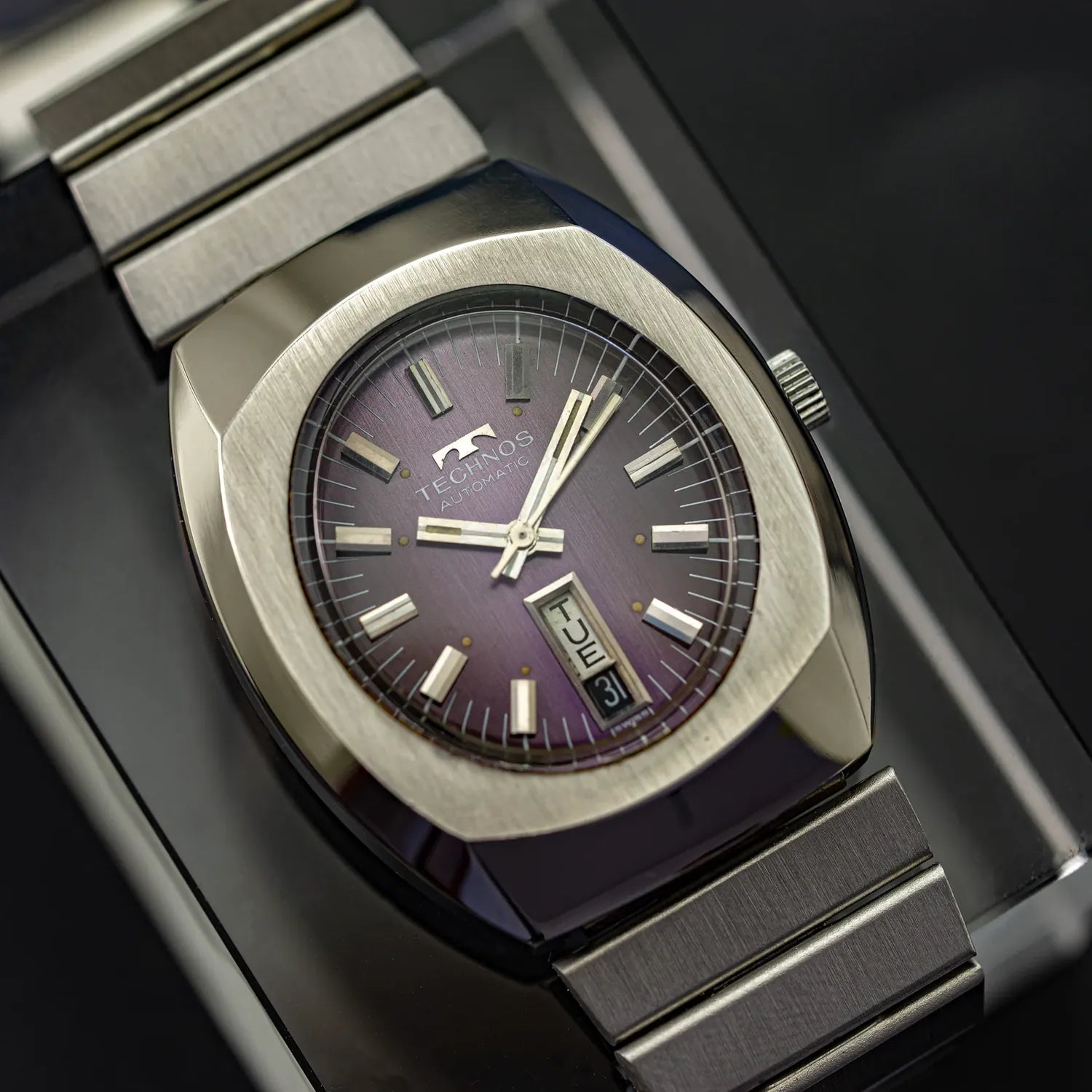 Affordable vintage watch on black background