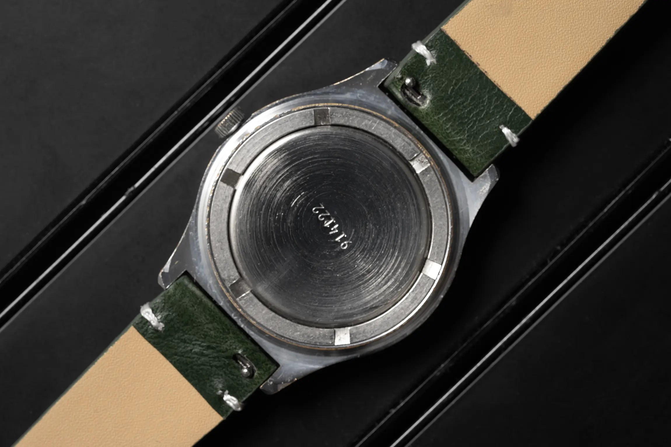 Caika Big Numerals caseback on black background