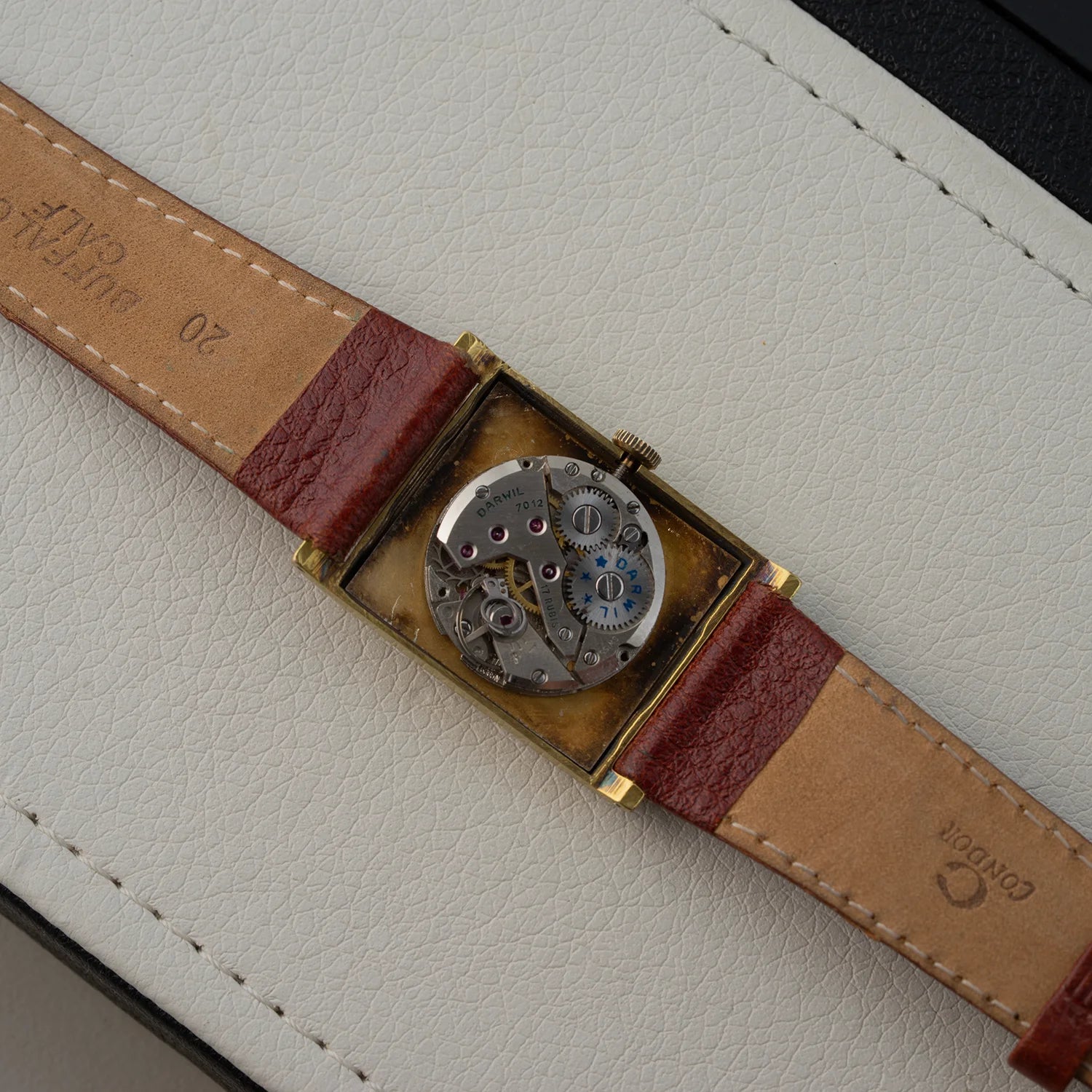 Open case Darwil Special Flat vintage watch showing manual wind movement Cal. 7012