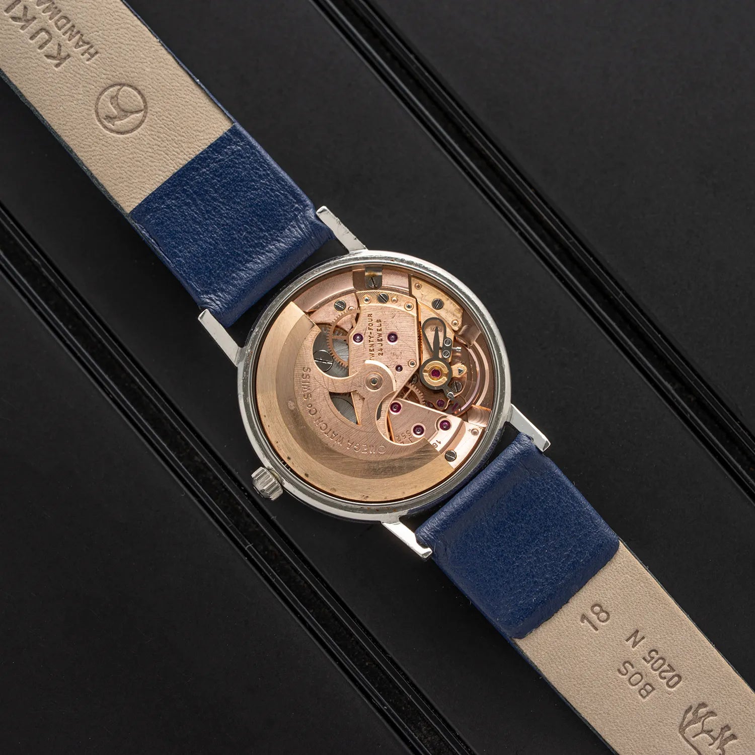 Omega, Ref. 14786SC, Cal. 552 Movement o na black background