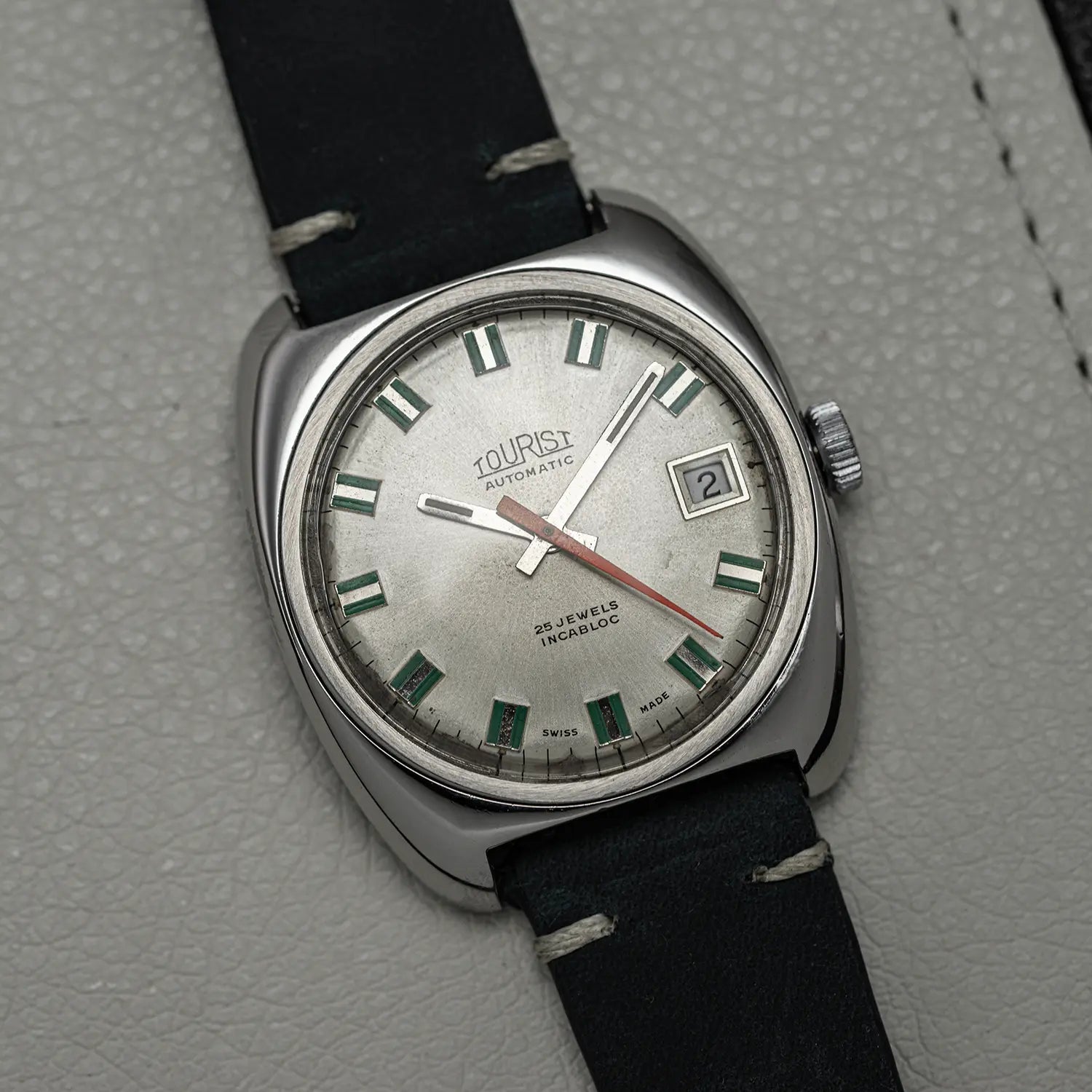 Tourist Automatic ETA 2784 on white leather background