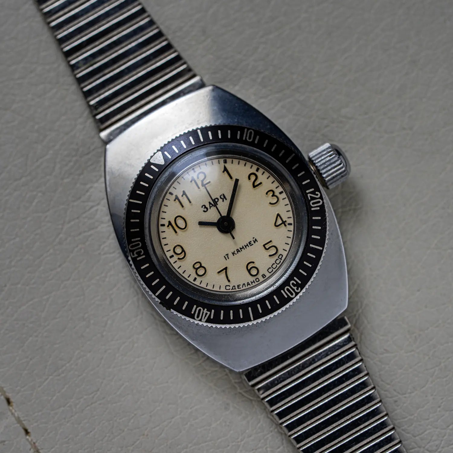 Zarya Women's Diving Watch, Cal. Z15098 on white leather backround