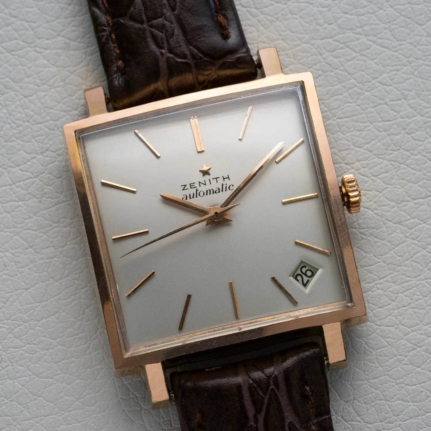 Zenith JFK Automatic 2532 PC Vintage Watch on white leather background