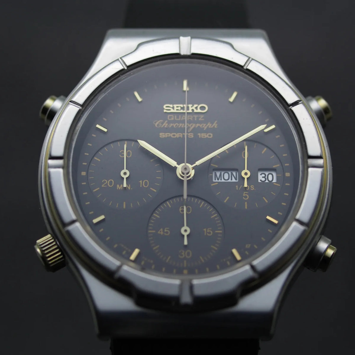 1986 Seiko Sports 150 7A38-713A with charcoal chronograph dial, gold-tone markers and day-date display