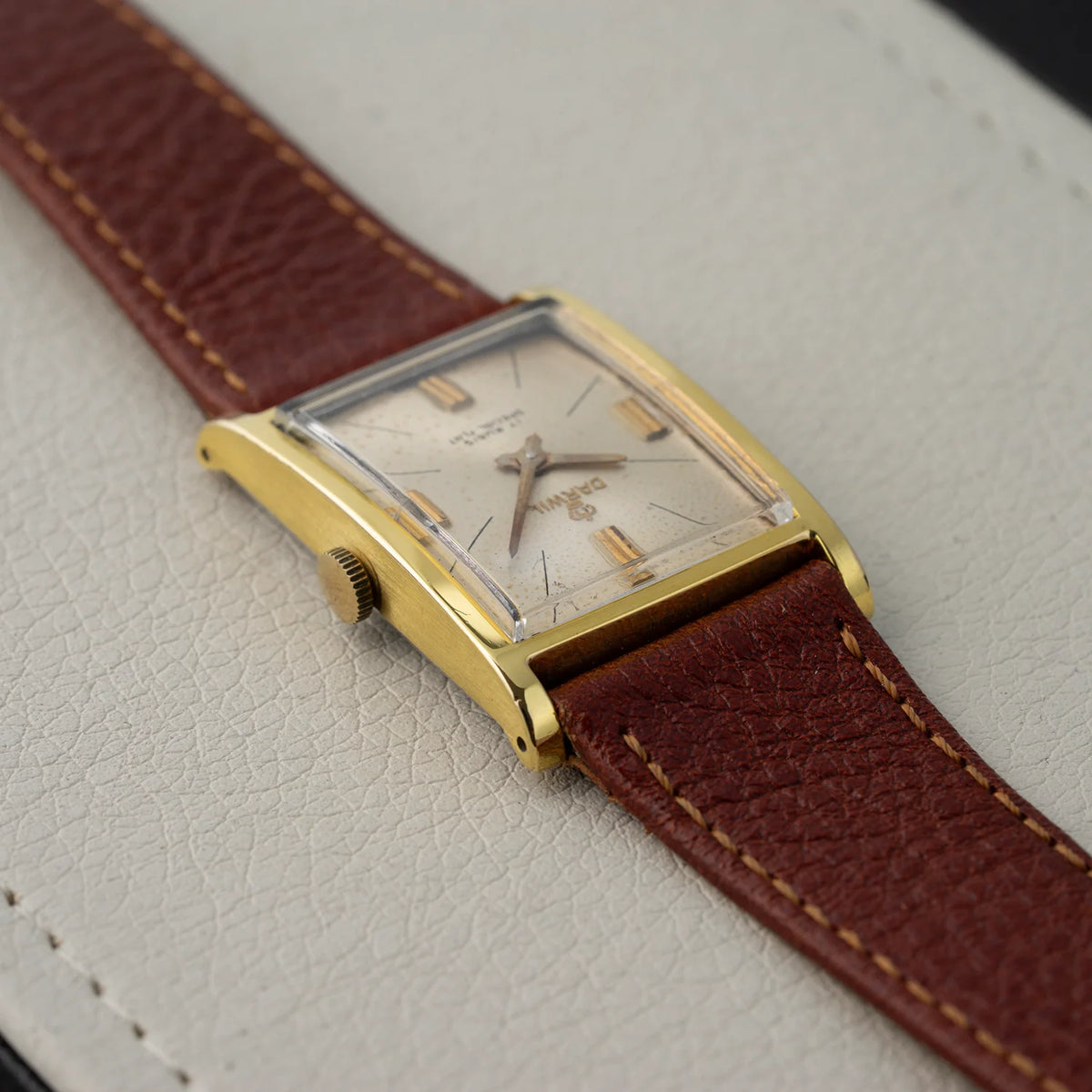 Side detail of Darwil Special Flat vintage watch with signed crown, silver dial, and rectangular case