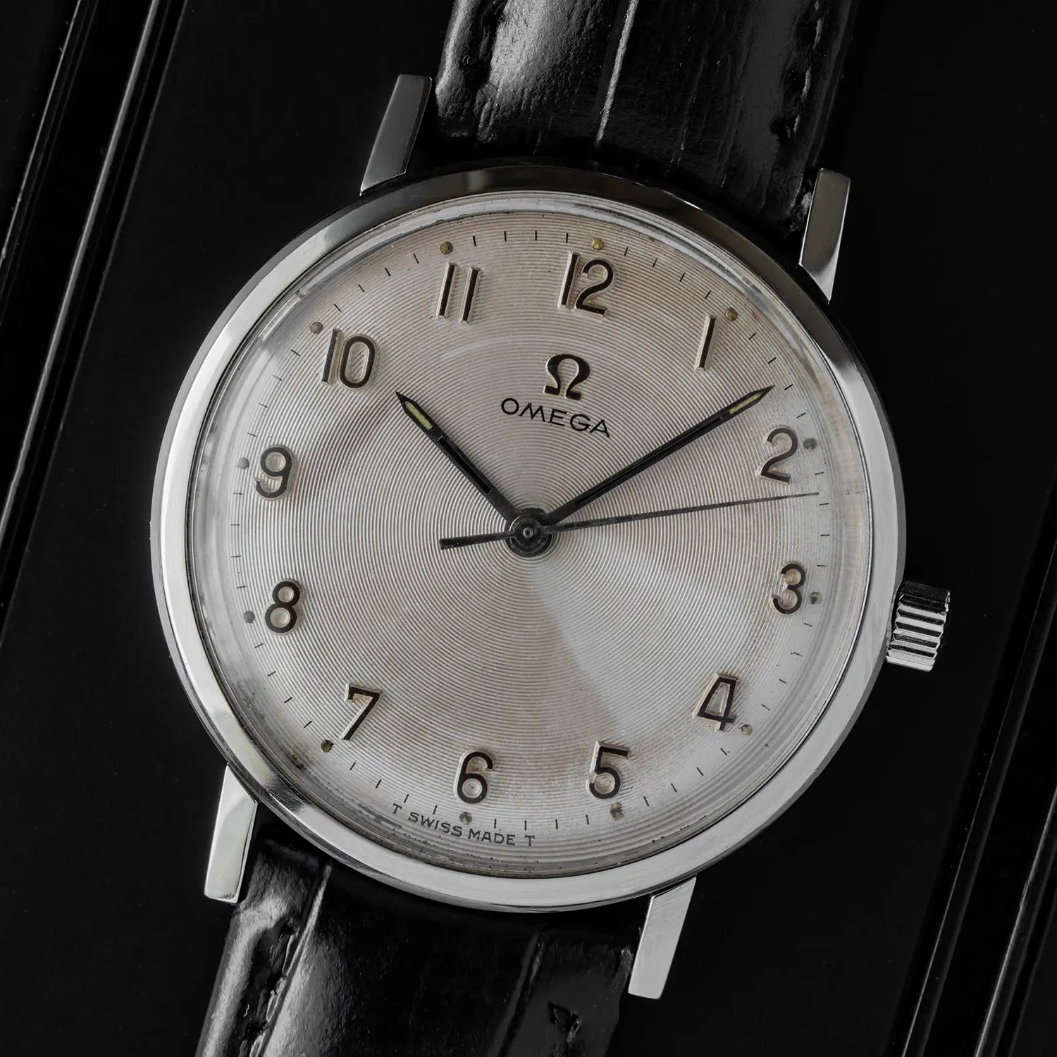 Omega 131.019, Cal. 601 on black background