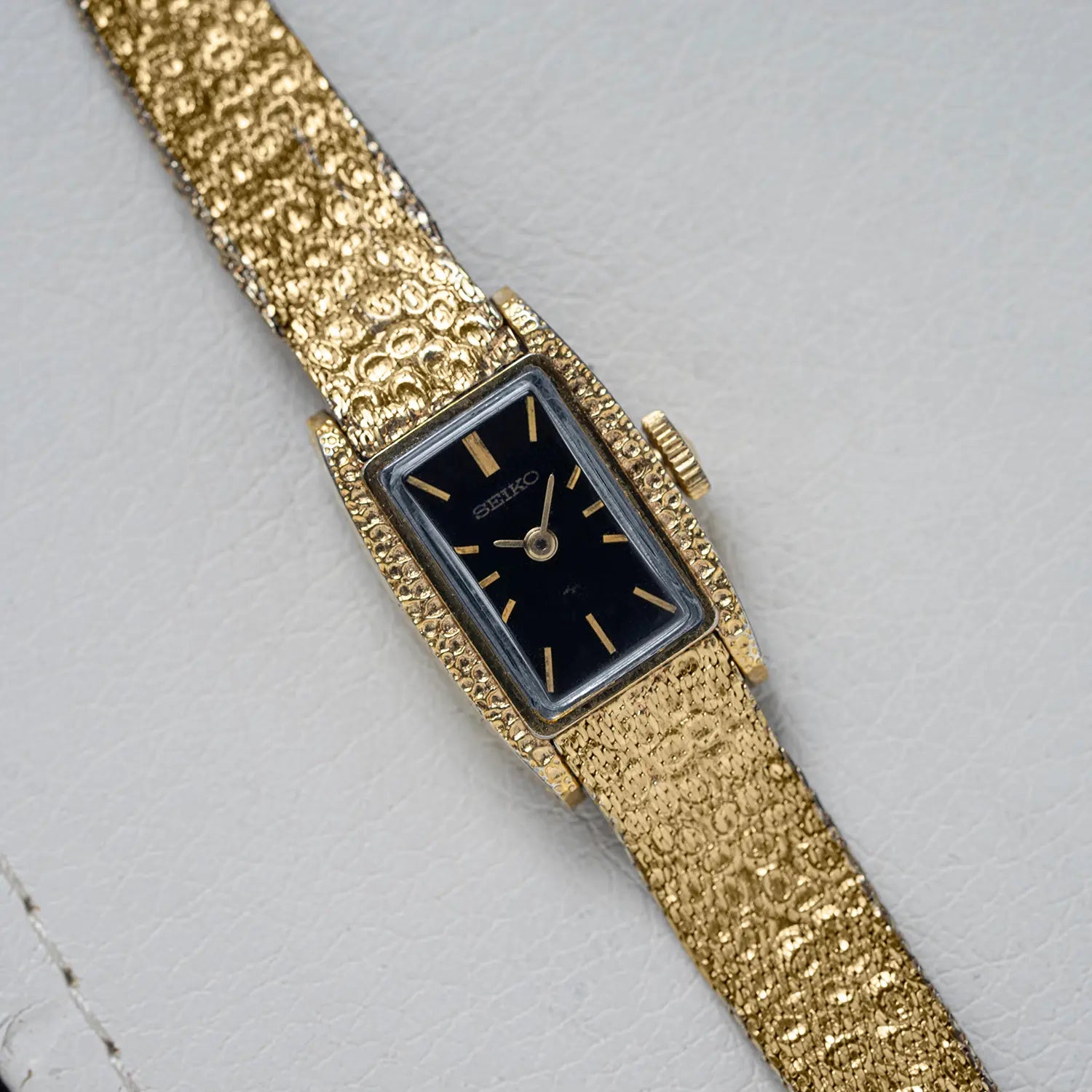 Seiko 11-3180 on white leather background