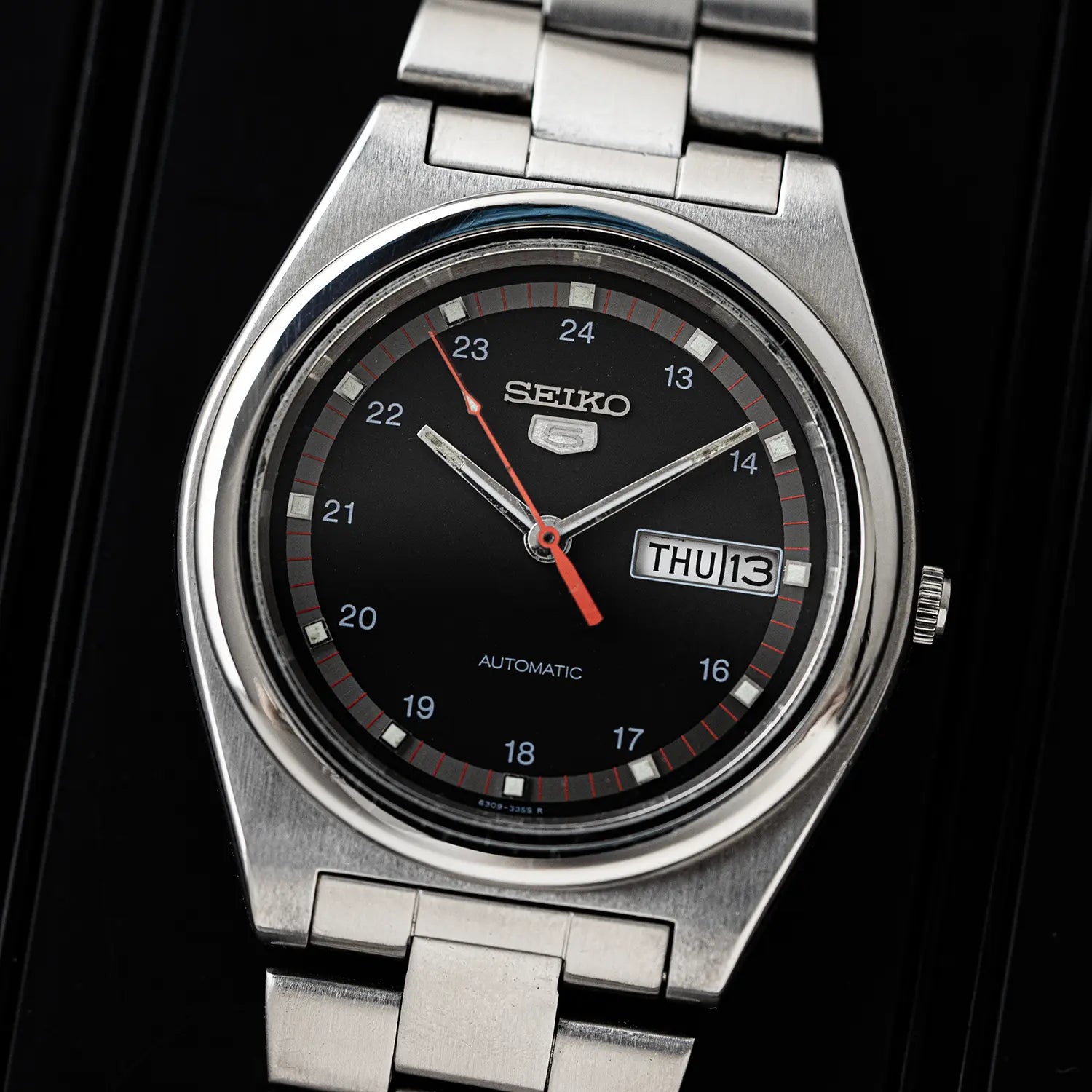 Seiko 5 6309 8980 Black Dial on black background