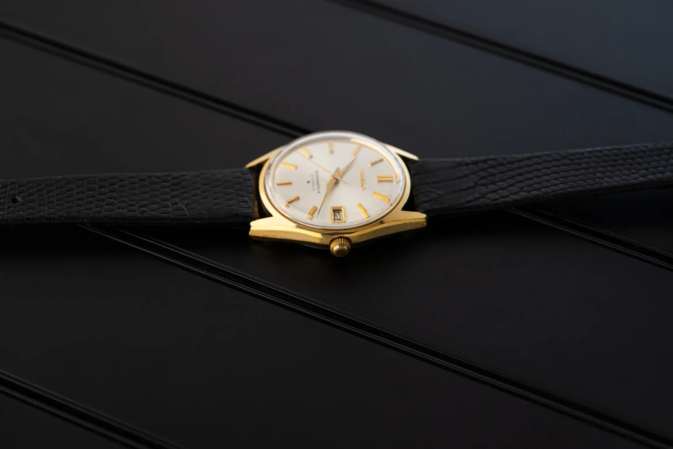 Seiko 8305 8010 crown with a white face on a black background