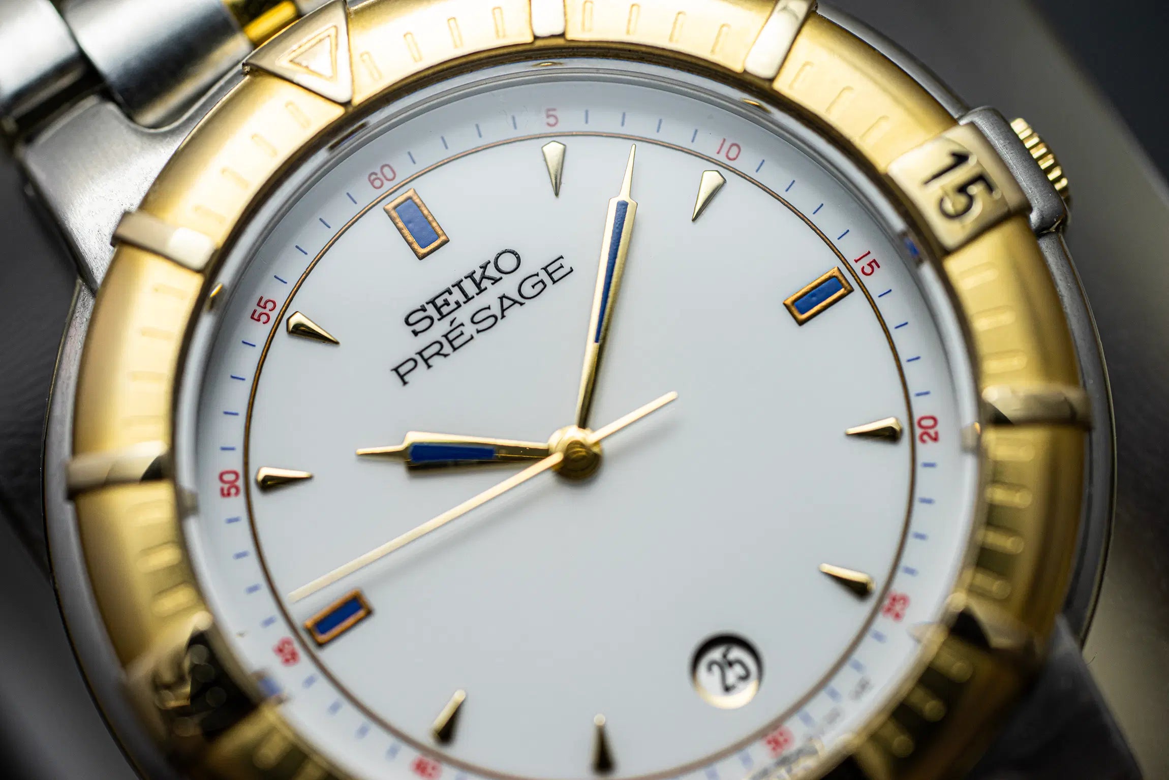 Seiko Presage 5E32 6A00 watch with gold casing and white face