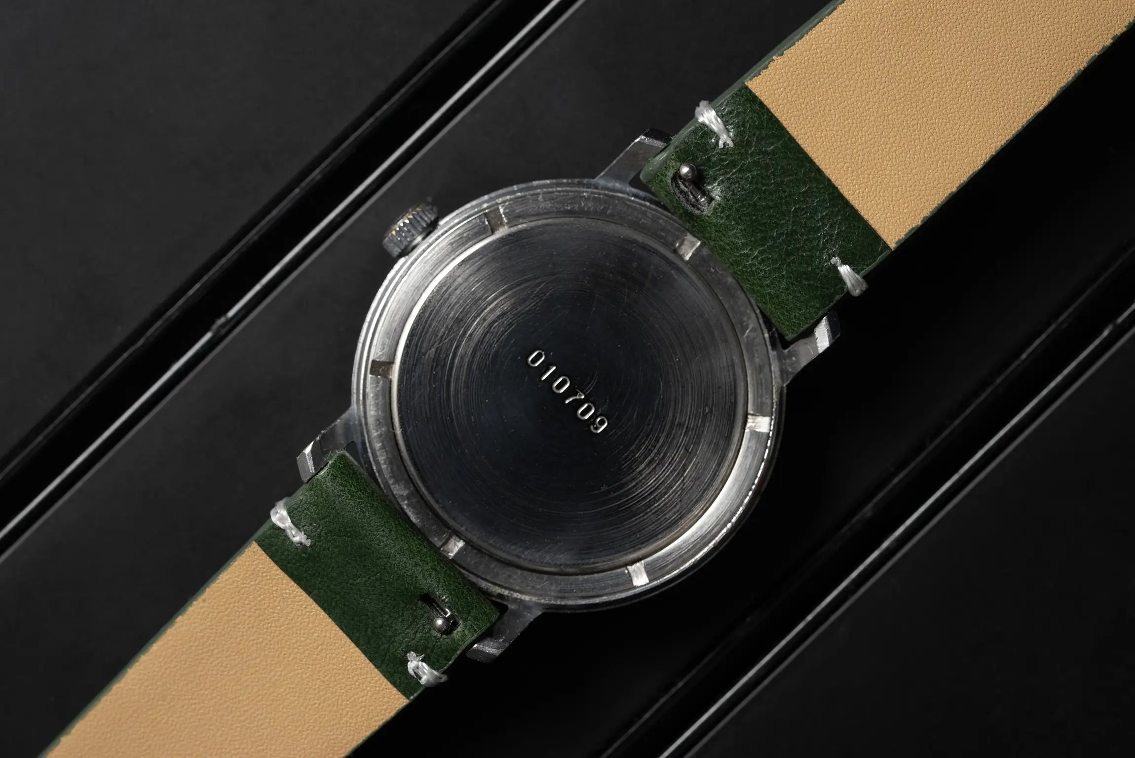 Vostok Cal. 2209 Caseback on black background